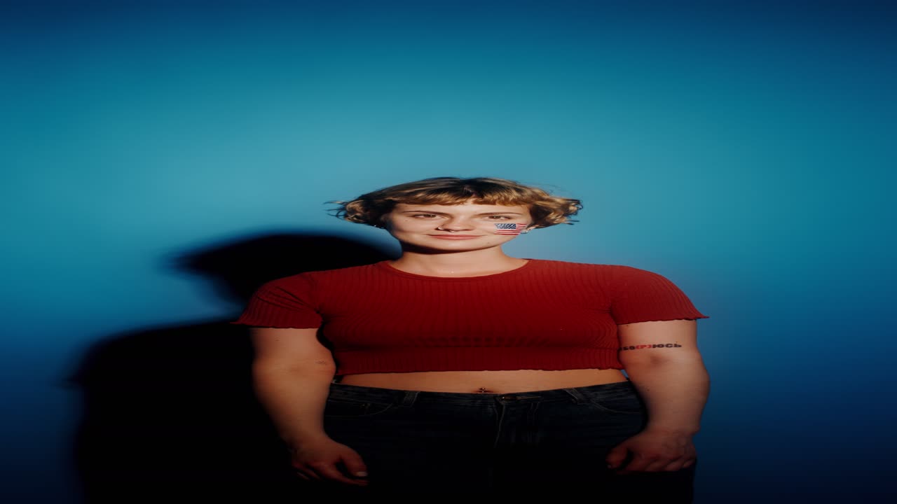 ritratto di una donna con la vernice per la faccia della bandiera americana