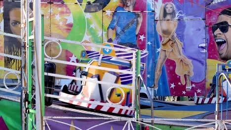 friends enjoying a spinning amusement park ride