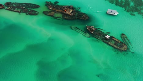 Great-dive-site,-clear-water,-Shipwrecks-at-Moreton-Island,-drone-view,-Queensland-Australia