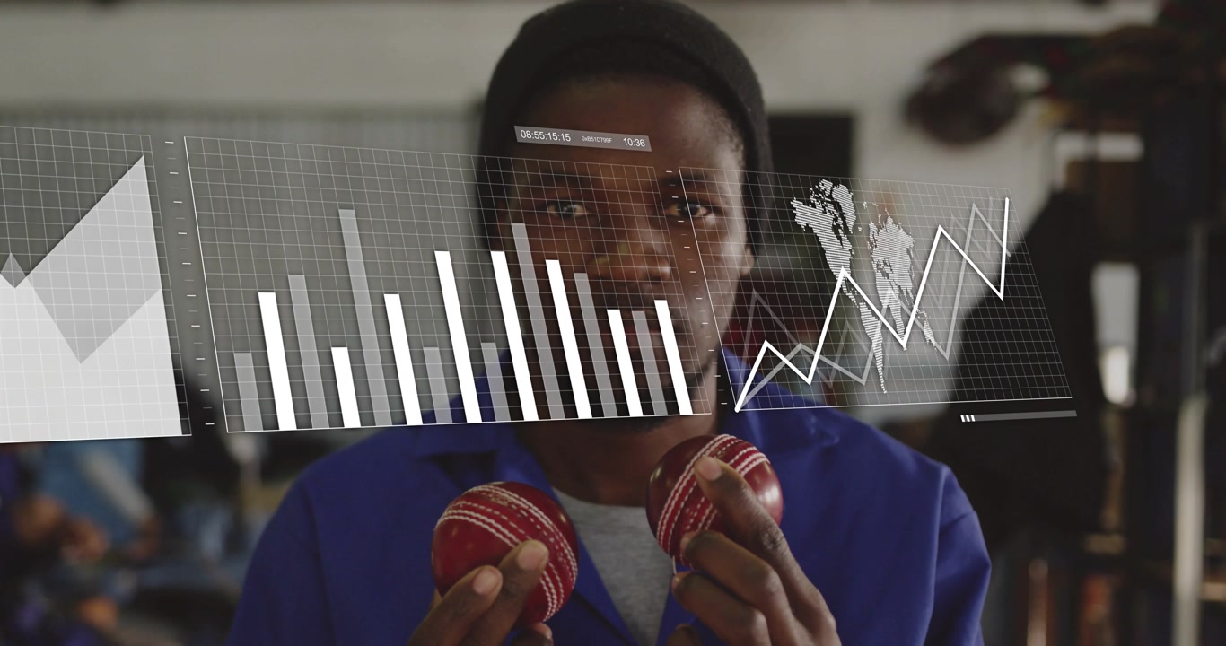 Technician rotating cricket balls displaying AR line graphs bar chart world map for tech analysis