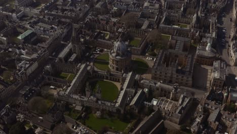 tight circling drone shot of bodleian library radcliffe camera oxford university at midday