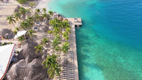 luxury tropical getaway views with palm trees and clear water, zanzibar beach jan thiel curacao