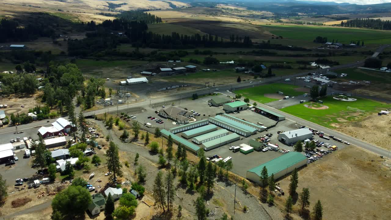 US, Oregon, Elgin, 2025-08-07 - Drone view of the city and City Hall in Summer