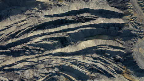 old rock quarry plant with beautiful lines and colors in the rock