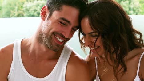 smiling couple hugging