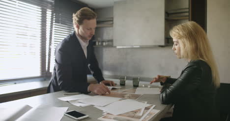 businessman in meeting with female colleague