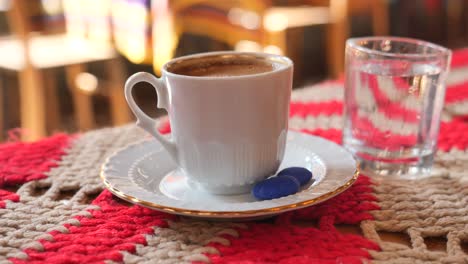 turkish coffee with water on a cozy table