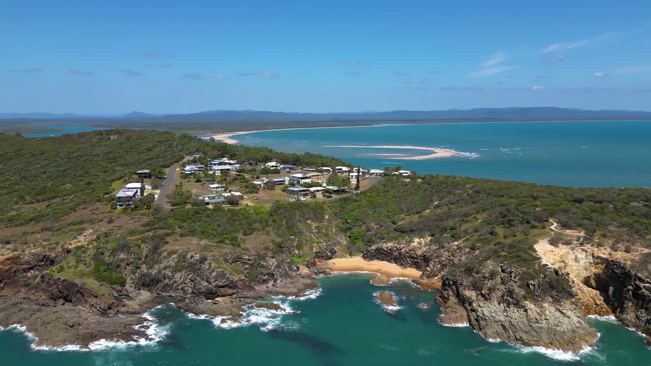 Right to left aerial views over the Town of 1770, Central Queensland, Australia