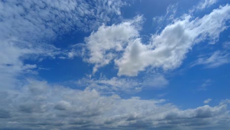 beautiful cinematic blue sky with foamy clouds timelapse dreamy time lapse showing time pass by during rainy season - gambia