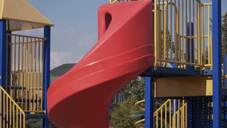 tilting playground swing summer hot day noon amusement set bright