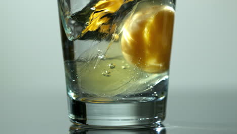 effervescent vitamin tablet in glass of water