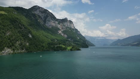 aerial forward view of lake in a mountain landscape