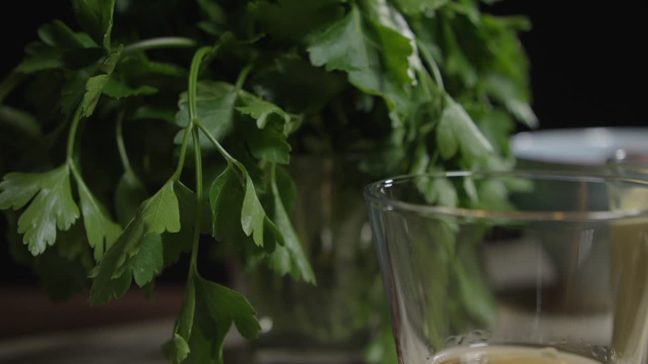 Close dolly shot of lined up ingredients for the legendary caf&eacute;-de-paris sauce
