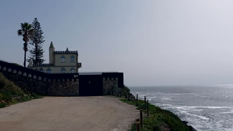 in this castelinho, a charming house on the waterfront that connects cascais to lisbon, located next to the cliffs and the sea beside it, it is said that there are ghosts