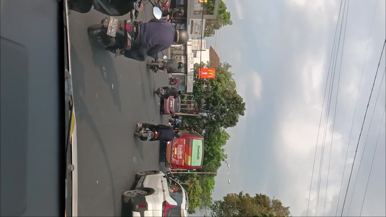 Traffic atmosphere in downtown Bandung, Indonesia in vertical shot