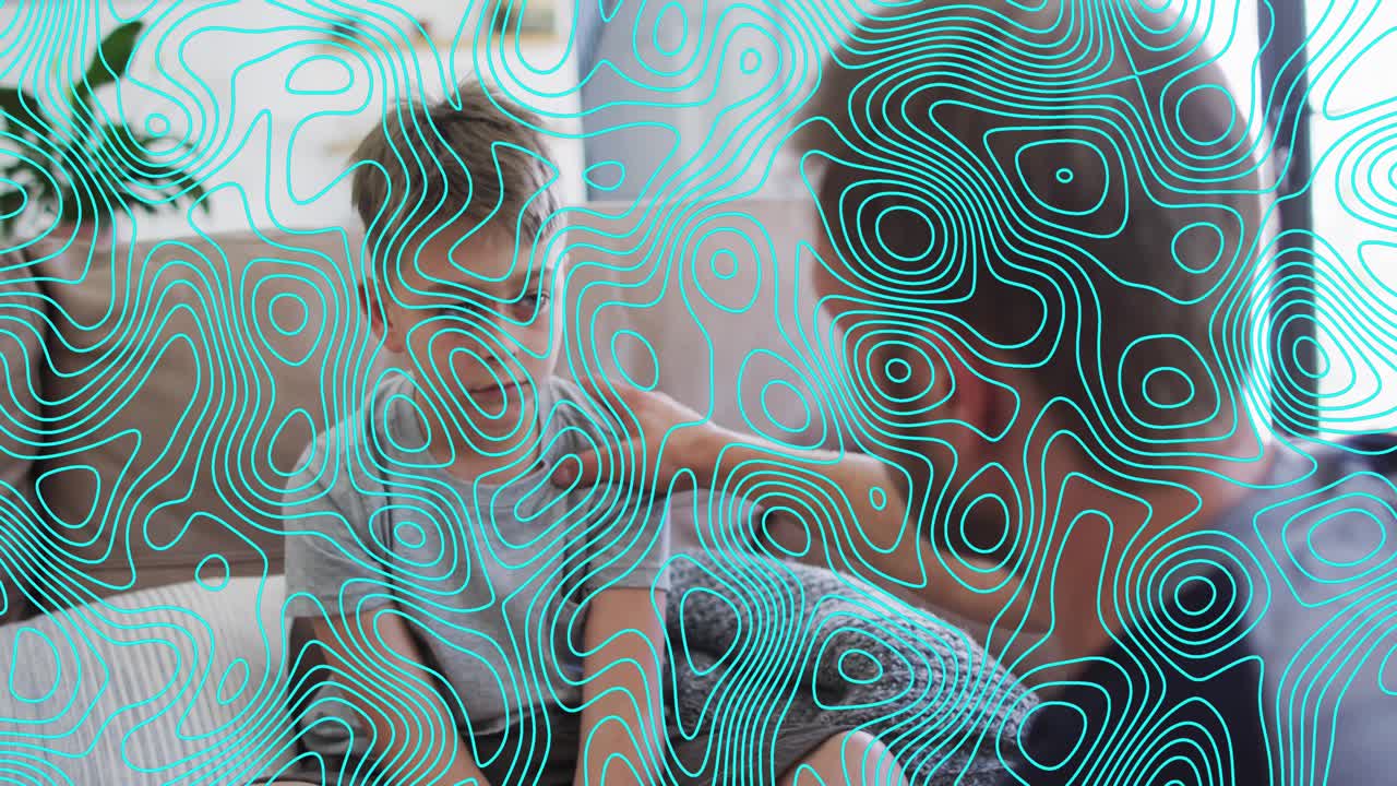 Animation of shapes over caucasian father and son