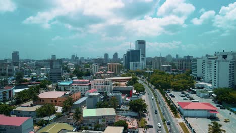 victoria island lagos, nigeria - 24 june 2021: drone view of major roads and traffic in victoria island lagos showing the cityscape, offices and residential buildings.