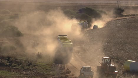 trucks taking straw to market