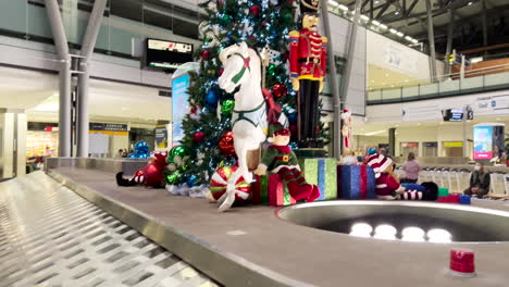 airport travel at christmas time - baggage carousel