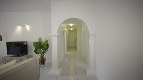 bright and minimalist hallway and living room interior
