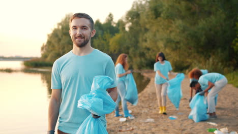 community volunteers cleaning up a riverbank