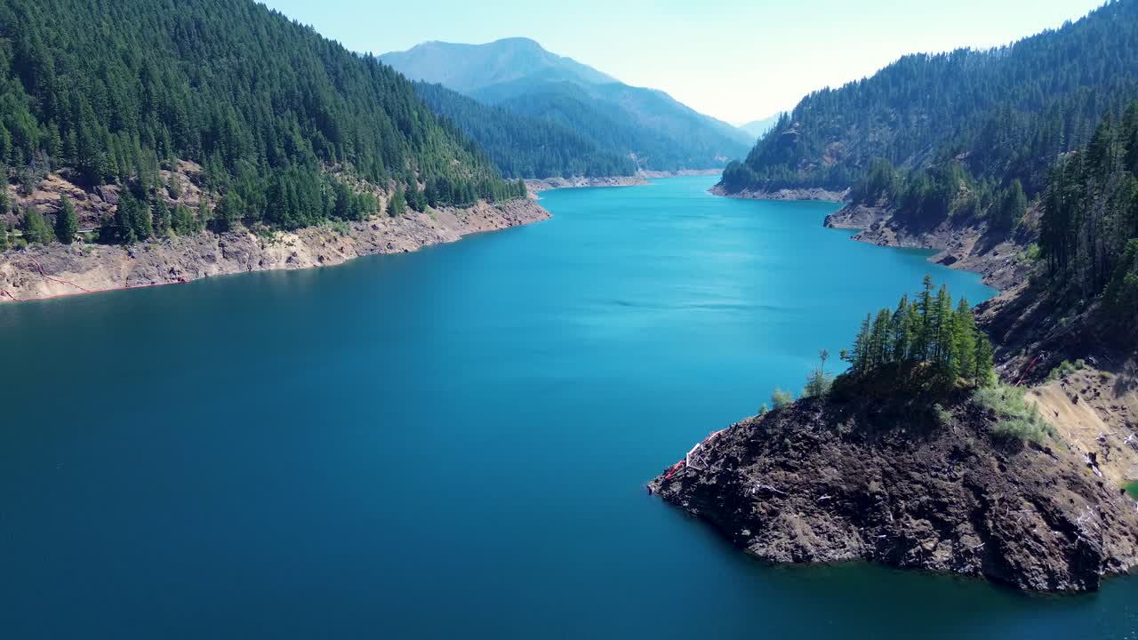 Drone aerial landscape of Cougar water reservoir dam lake river with mountains hills covered in pine trees Oregon USA America nature Terwilliger travel tourism nature wilderness