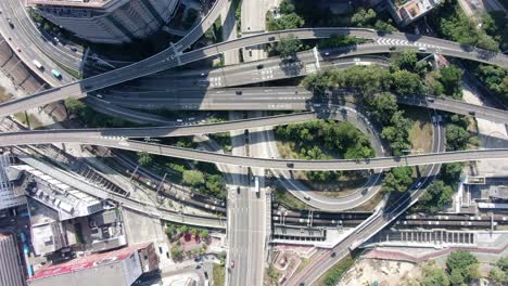 Massive-Highway-interchange-with-traffic-on-all-levels-in-downtown-Hong-Kong,-Aerial-view