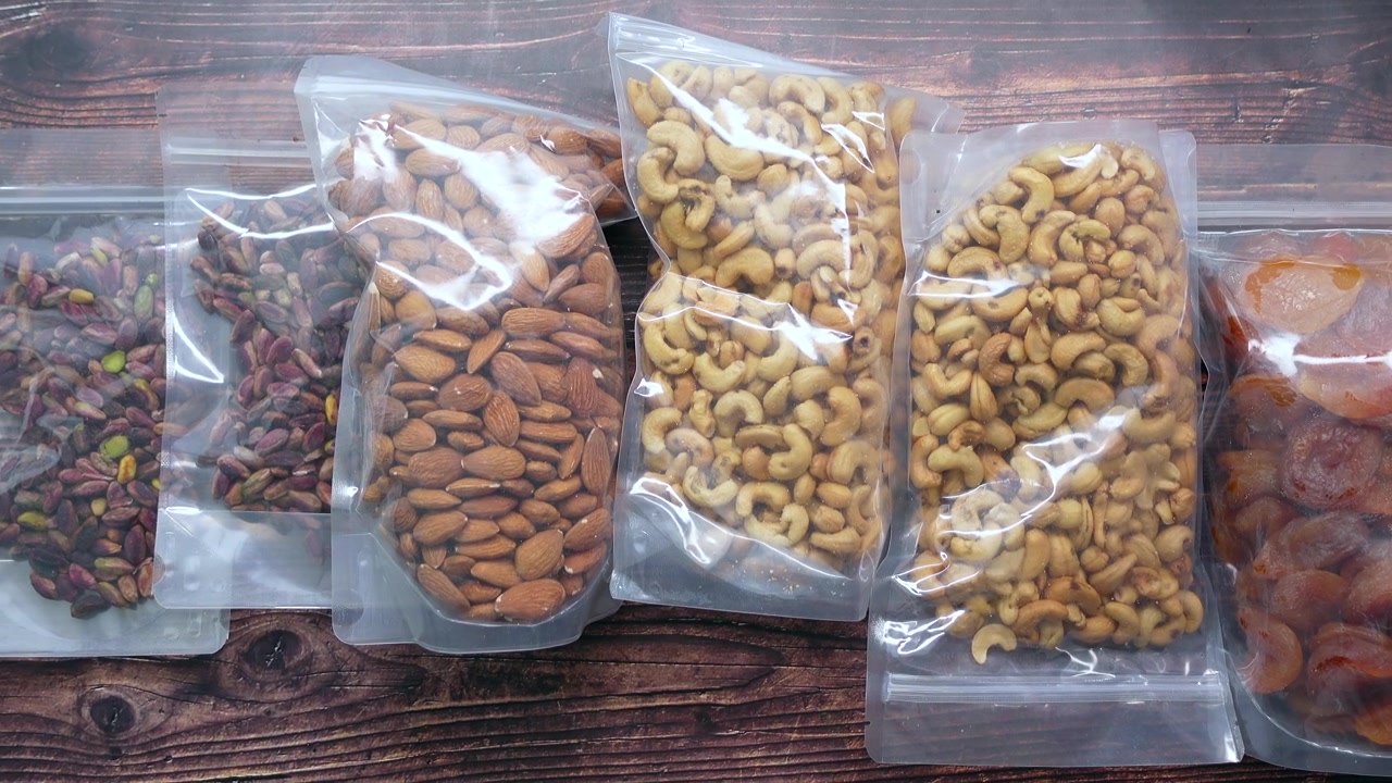 Assortment of Healthy Nuts and Dried Fruits in Plastic Bags