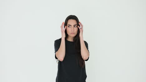 woman with hands on temples displaying various emotions like headache, thought, and relaxation