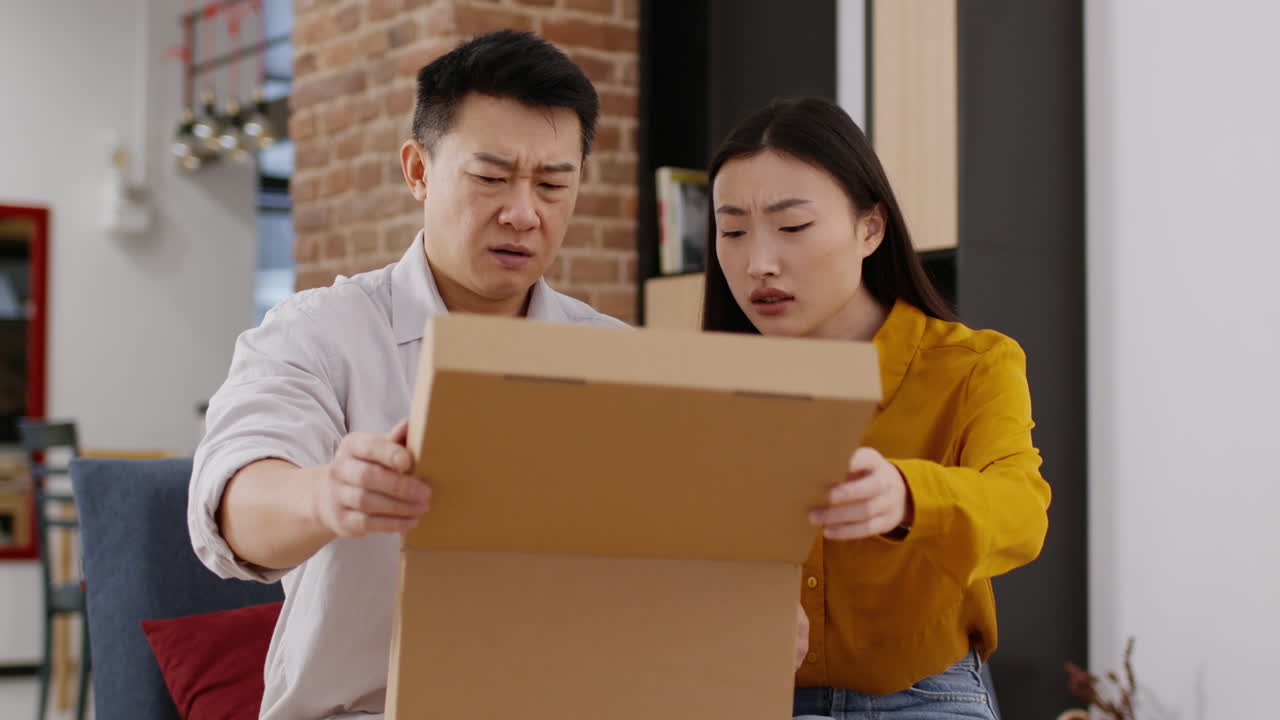 Couple Disagrees Over Moving Box Contents