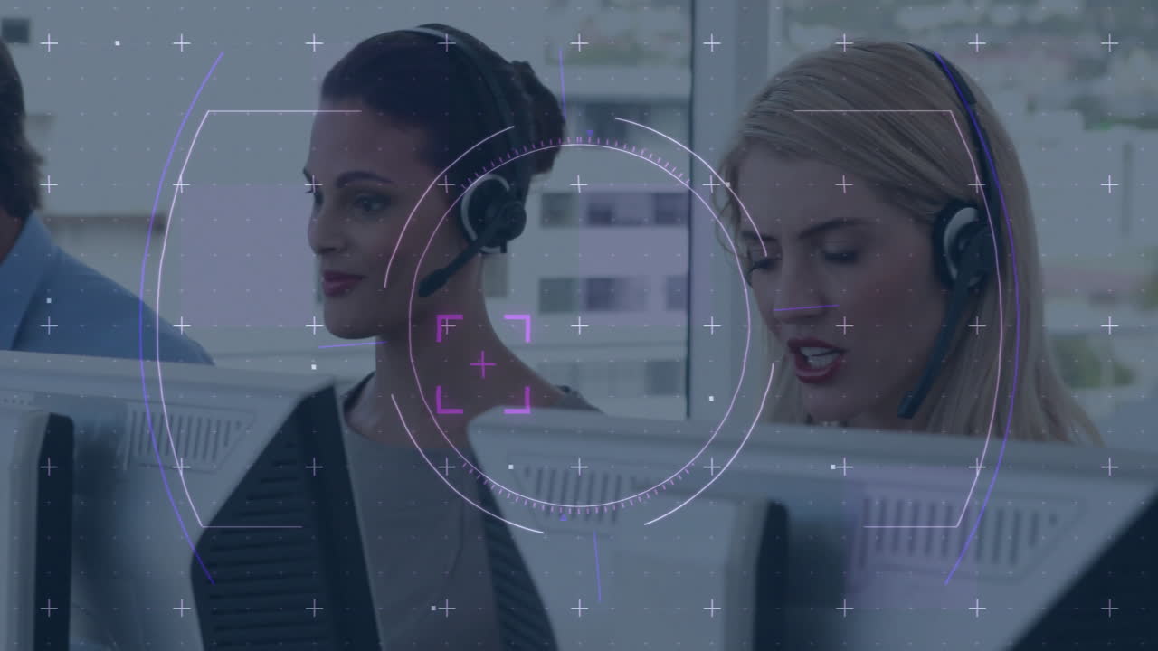 Working with animation overlay, two women in headsets at computers in school