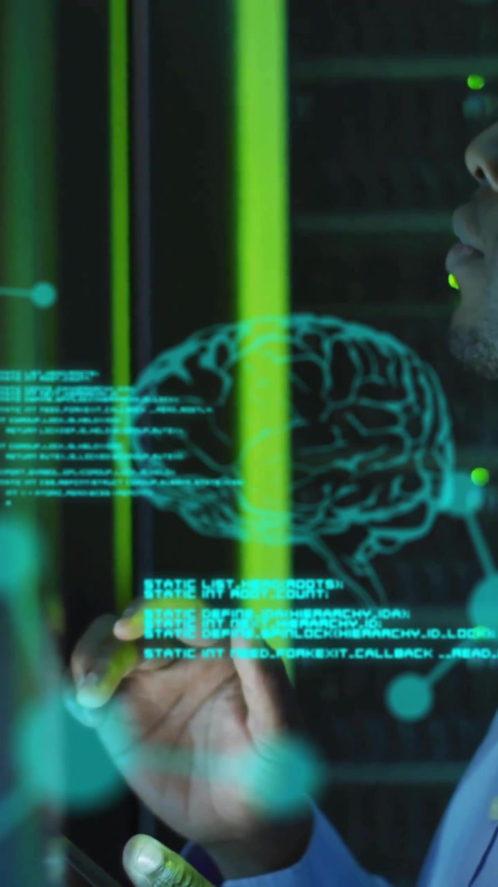 Animation of data processing with brains over african american businessman in server room