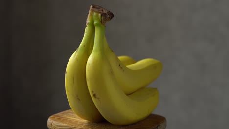 yellow banana on gray background