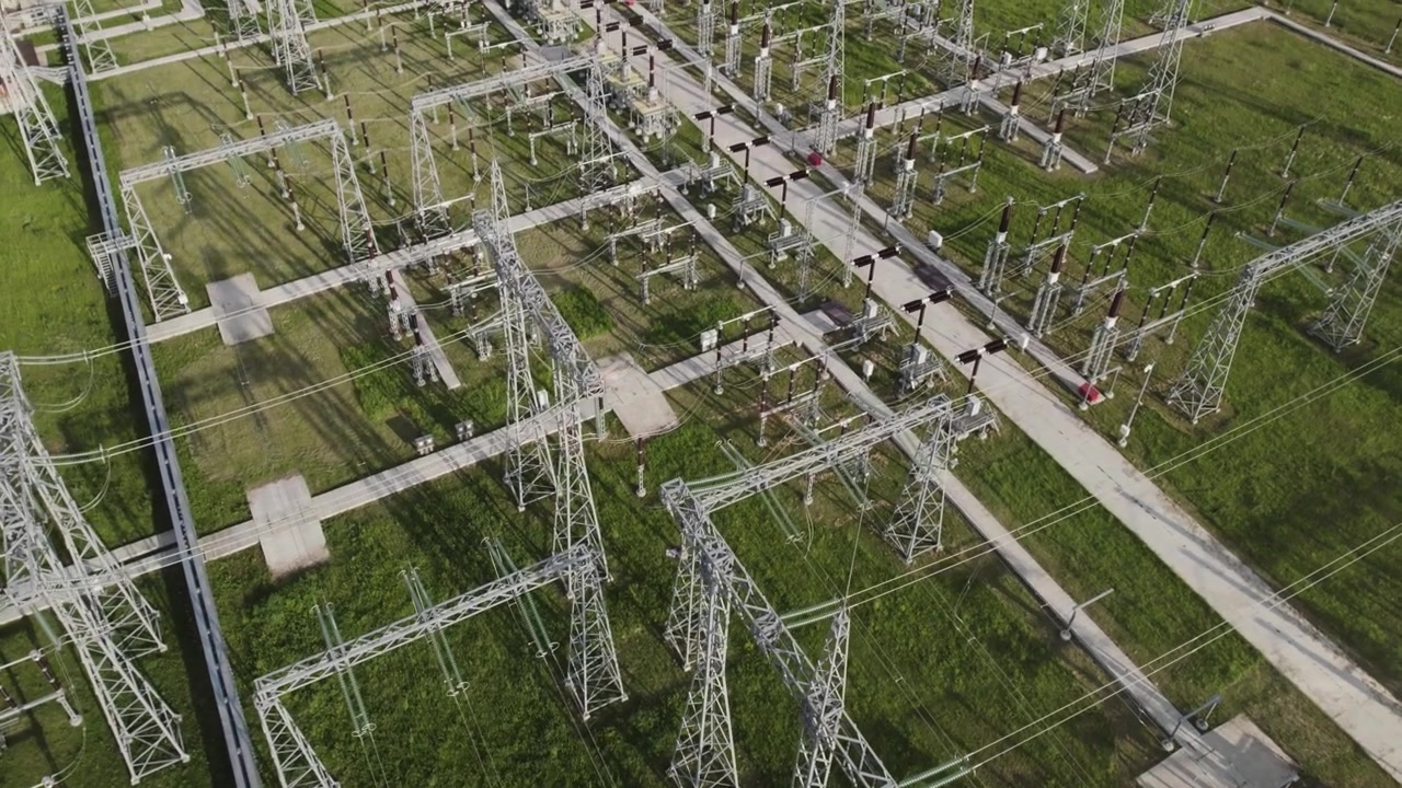 Aerial View of Electrical Substation with Power Lines