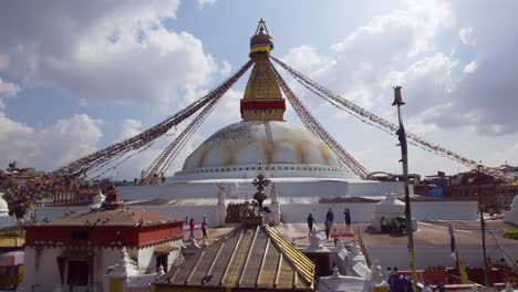 boudhanath stupa with prayer flags in kathmandu, nepal. - wide shot