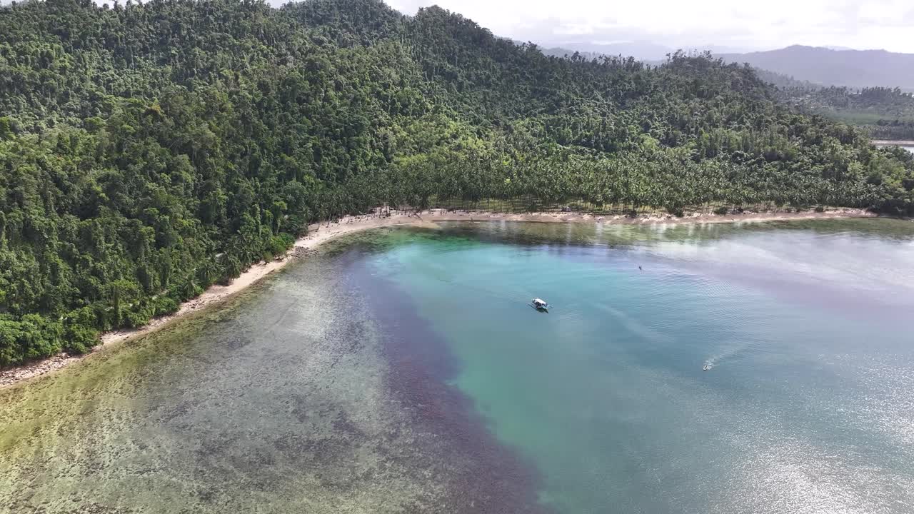 Aerial wide of Coconut Beach in Palawan Island, tropical exotic travel destination in Philippines.