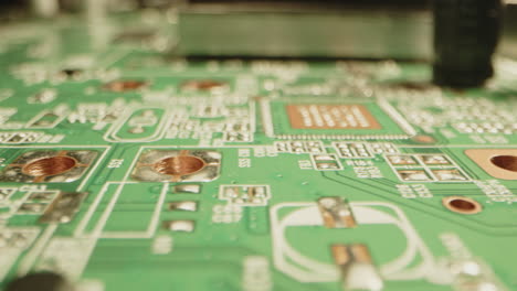 beautiful macro dolly of components on a printed circuit board in slow motion