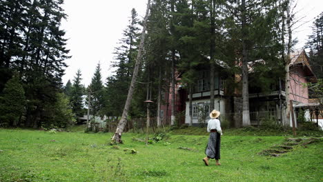 Romanian-girl-visiting-Vila-Klauss,-Romania-1