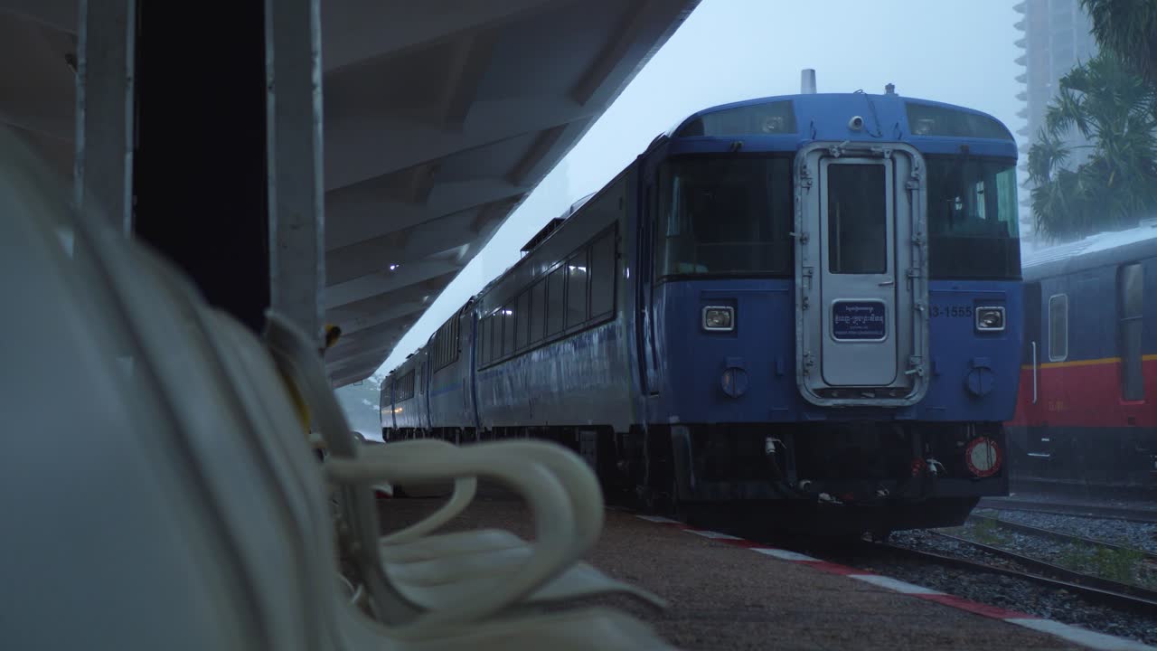 Torrential rainfall, extreme weather, railway station, locomotive
