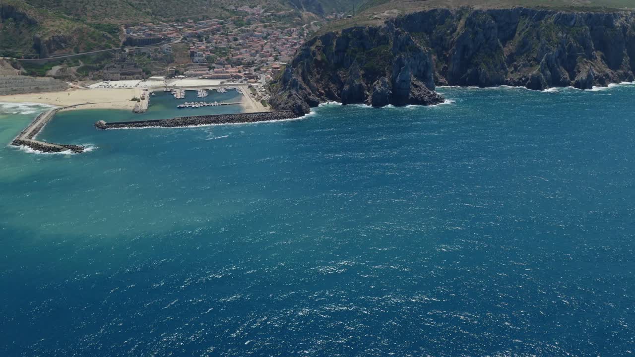 Aerial view of Buggerru's stunning blue sea and rugged coastline