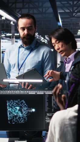 vertical video team of engineers doing brainstorming in server room using ai
