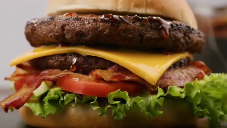 close-up of a delicious double cheeseburger with bacon