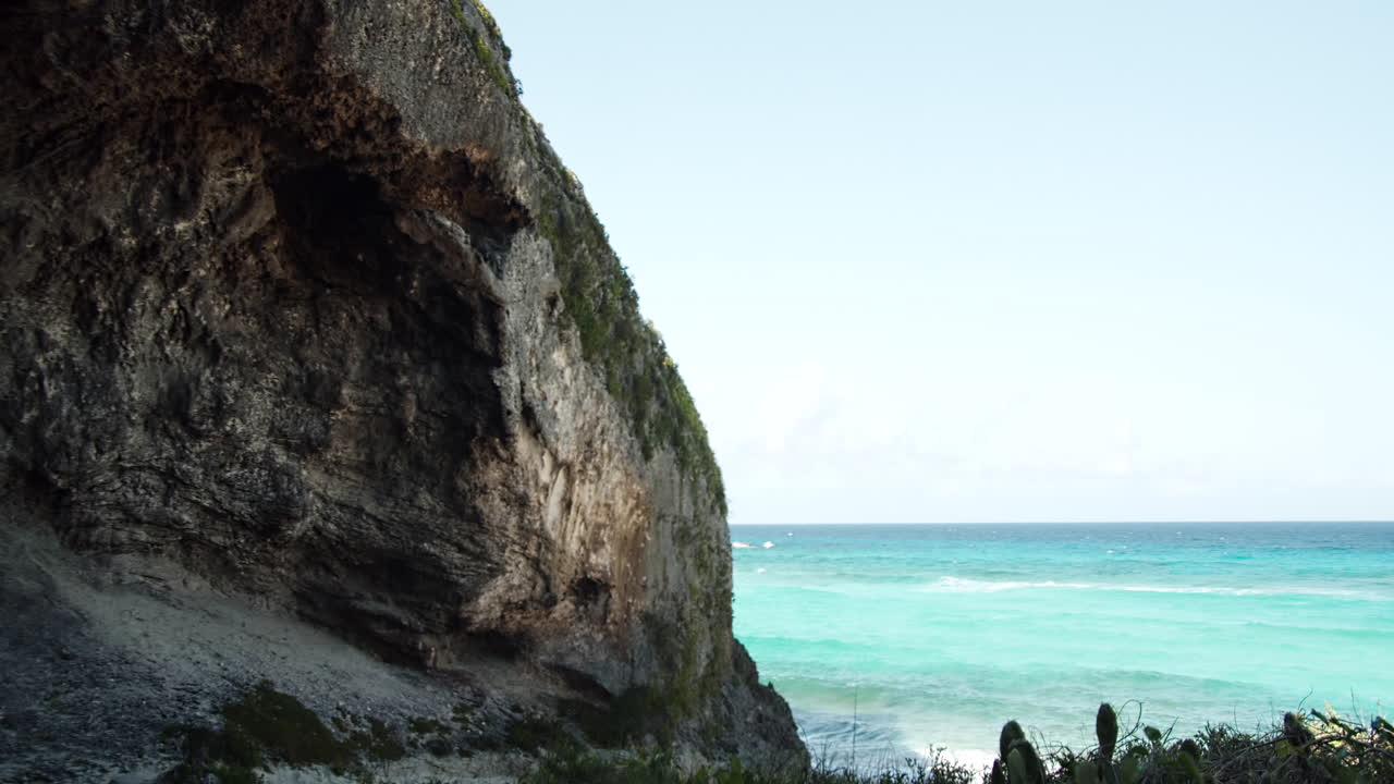 Limestone Rock Formation And Azure Water At The Mudjin Harbour In The Middle Caicos On A Sunny Day- wide shot