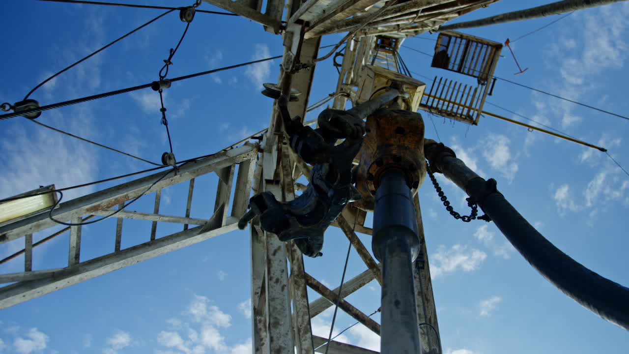 High tower with drilling equipment. Working machine for gas or oil production.