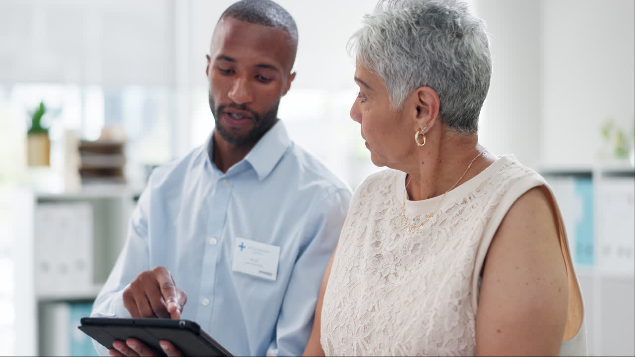 Doctor Discussing Information with Patient