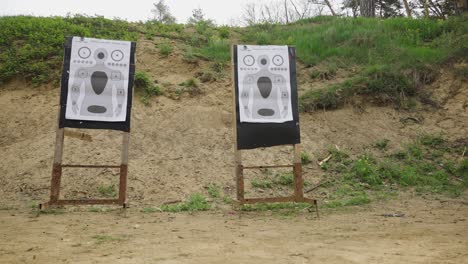 wooden stand with paper target at olesko shooting range, czech republic