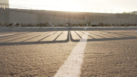 empty beach car park spaces covered in asphalt.