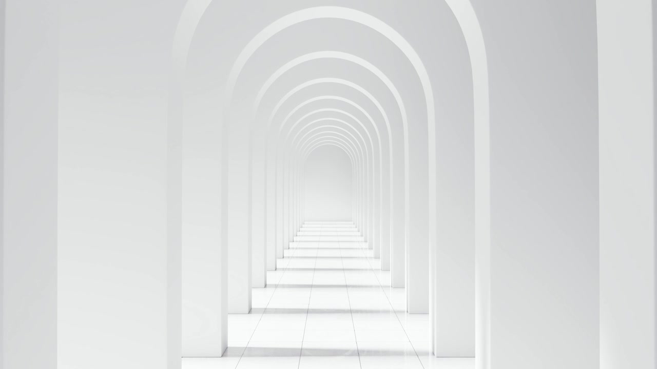 Attraversando un corridoio ad arco architettonico di un bianco brillante.