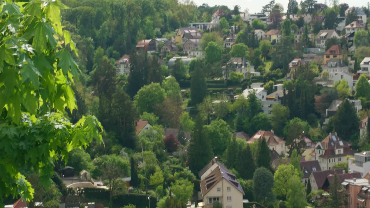 Scenic view of village homes on the cityside hills in Stuttgart, Baden Wurttemberg, Germany Balvaria, Europe, afternoon panning view angle