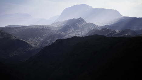 majestic mountain silhouettes at dawn create serene and calming landscape